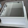 STELUX glass rooflight on a white upstand