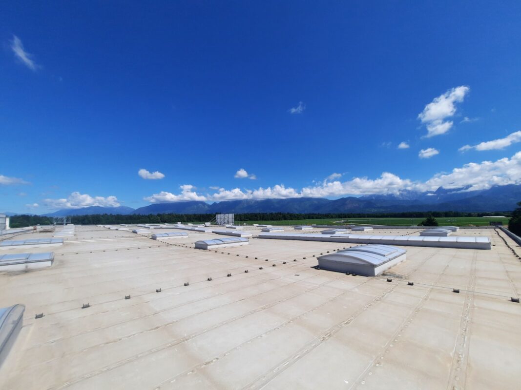 Renovated continuous rooflights on the flat roof of the Cargo-partner building in Šenčur, Slovenia